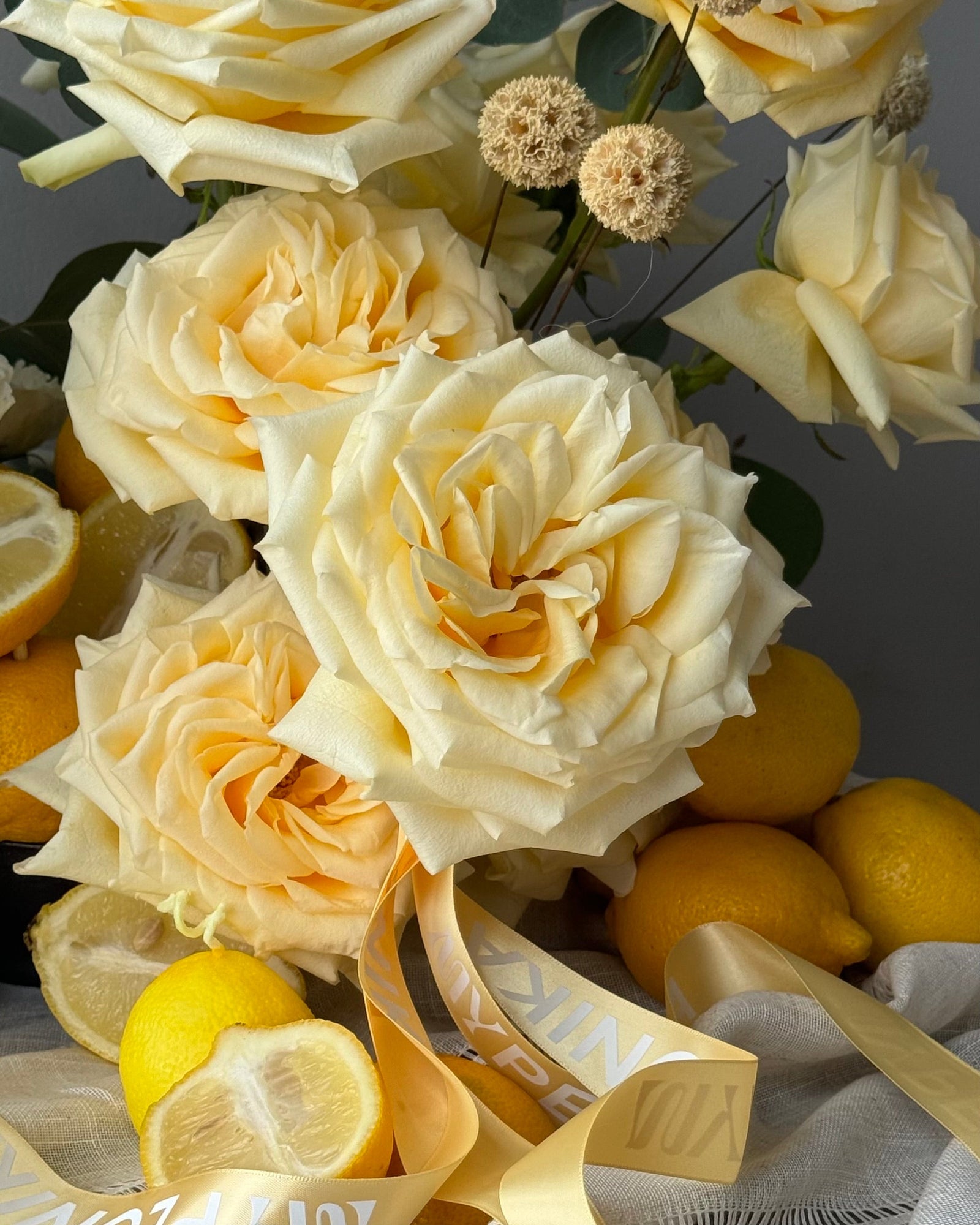 Interior arrangement “Lemons” - garden roses, eucalyptus