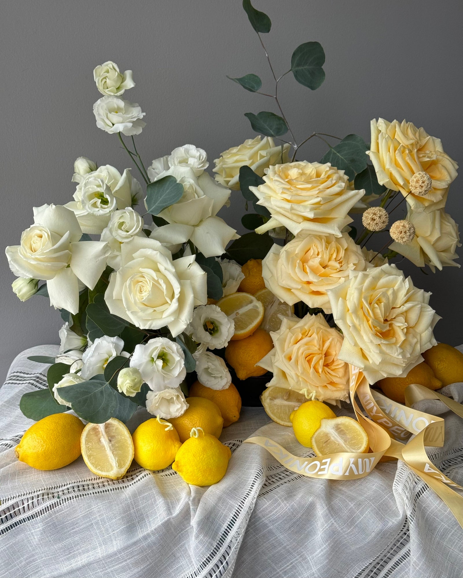 Interior arrangement “Lemons” - garden roses, eucalyptus