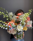 Interior arrangement "Sunlit Blooms" - peony rose, delphinium, ranunculus