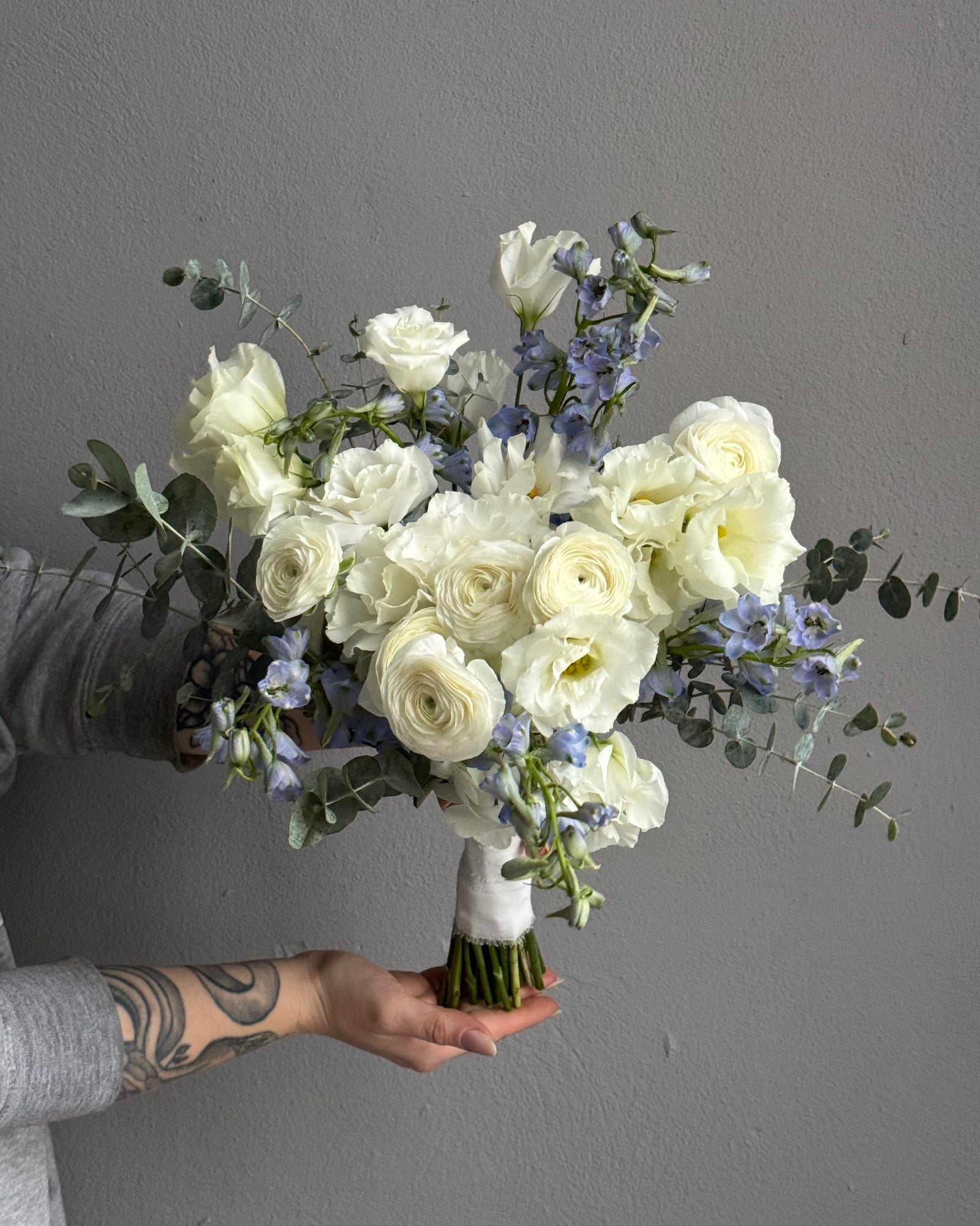 Wedding bouquet "Snowlight Bloom" - Ranunculus, delphinium, lisianthus
