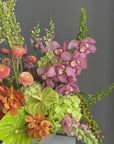Vase Arrangement “Sunset Theory” — ranunculus, anthurium, hydrangea, orchids